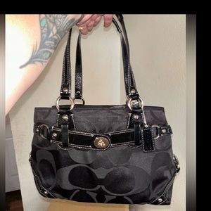 Beautiful black coach shoulder bag with blue interior